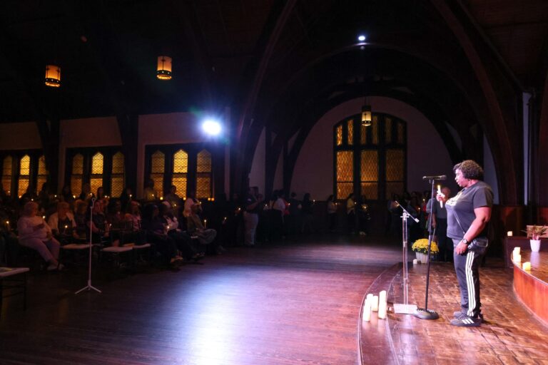 Wide view of the sanctuary as a speaker addresses the gathering