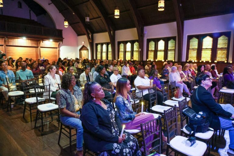 Attendees seated in the sanctuary during the program